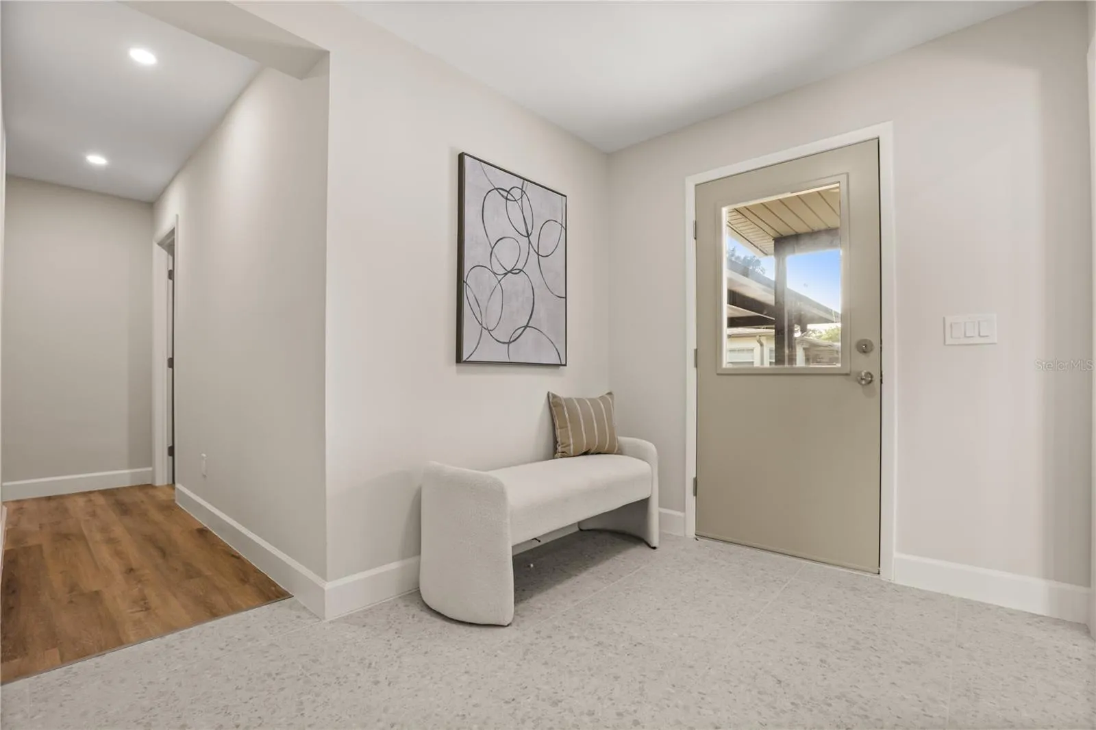 Rear Foyer with door to pool area