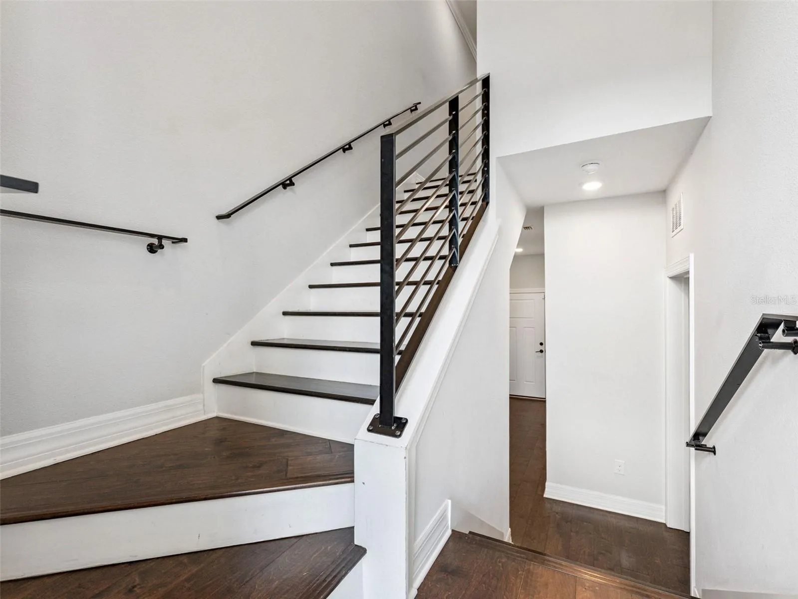 Brings you down to the first floor where the first bedroom and garage are.