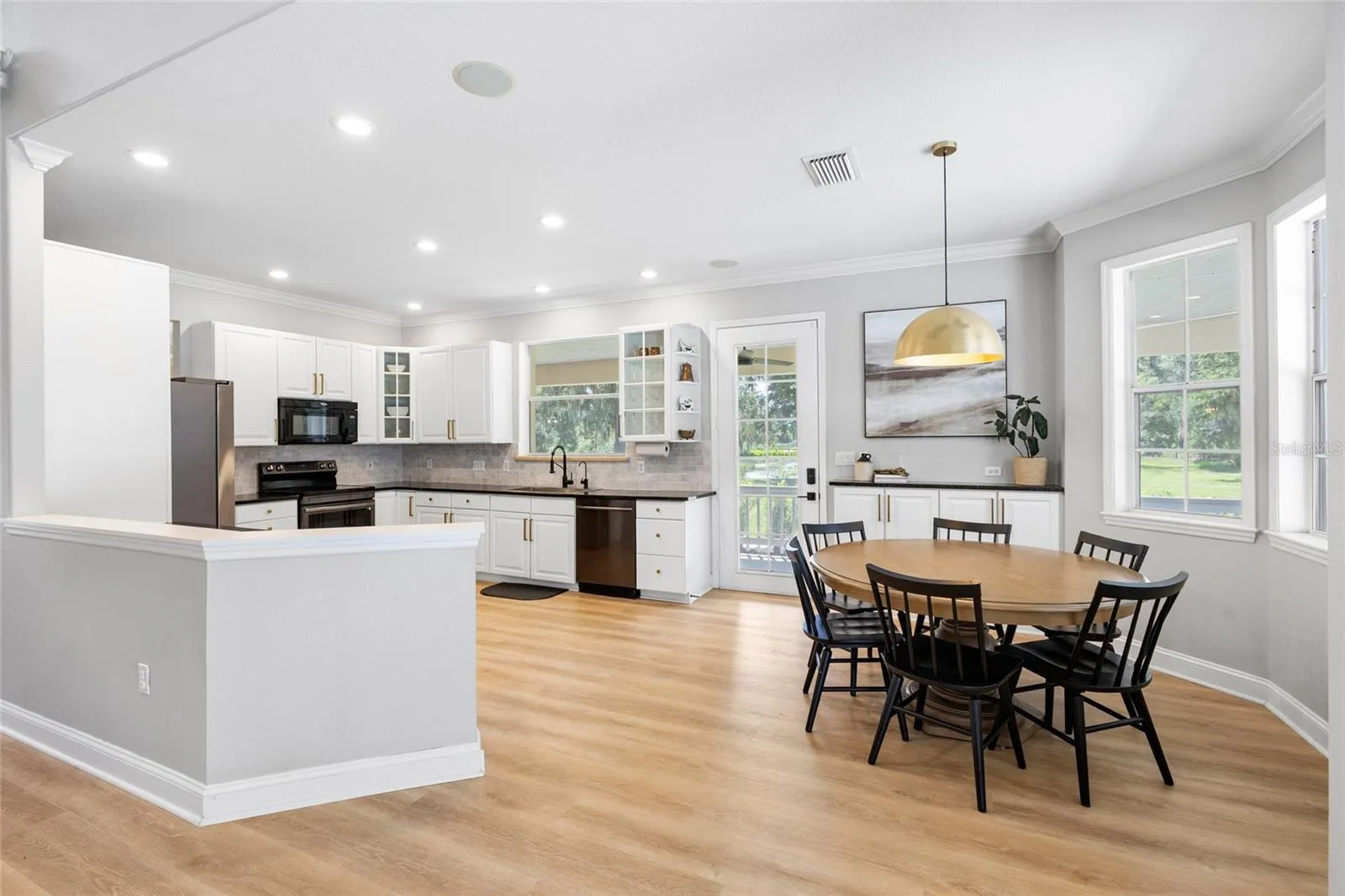 Kitchen and eat in nook area from the pool.