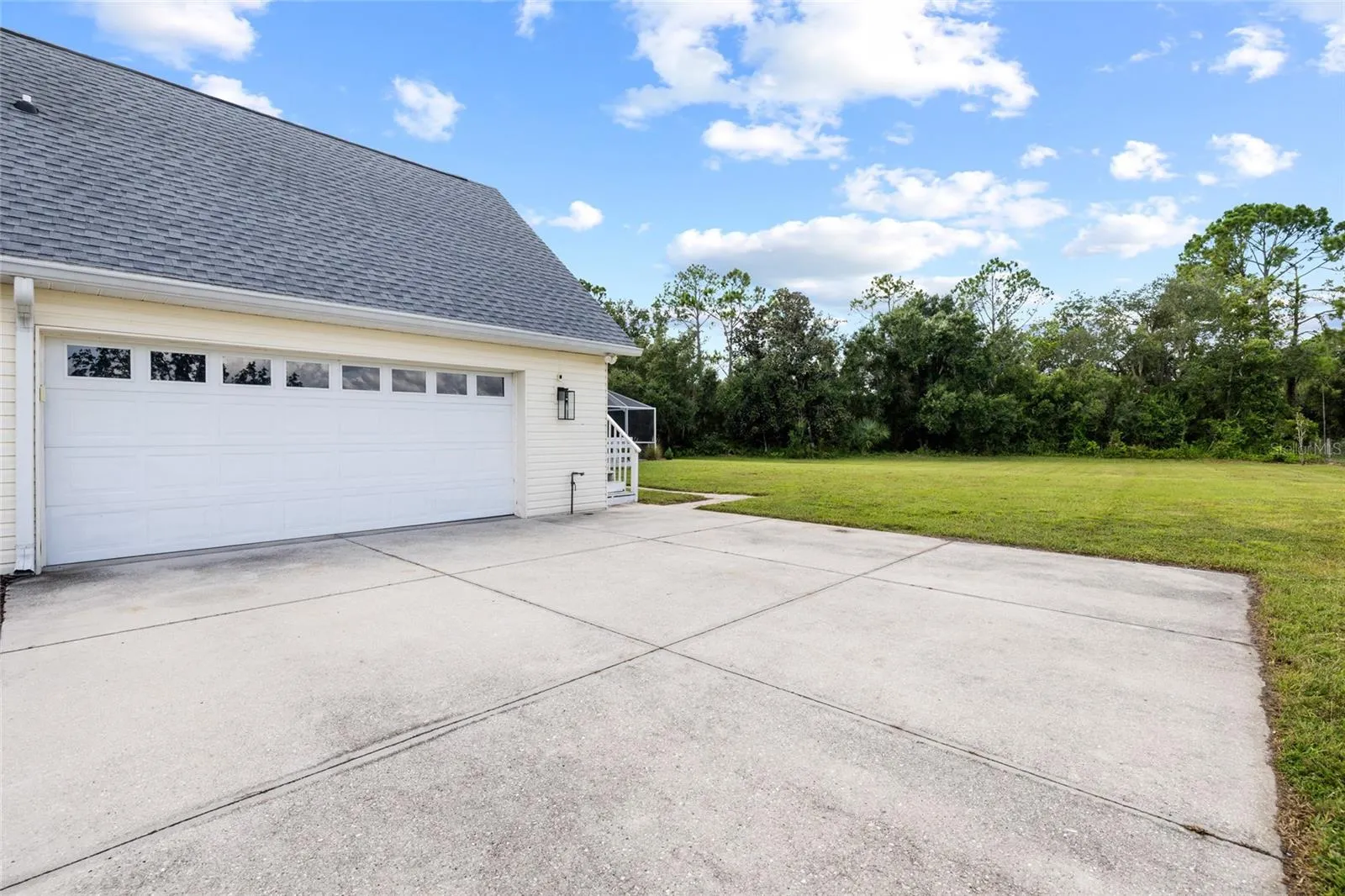Side garage - garage suite above with private entrance.
