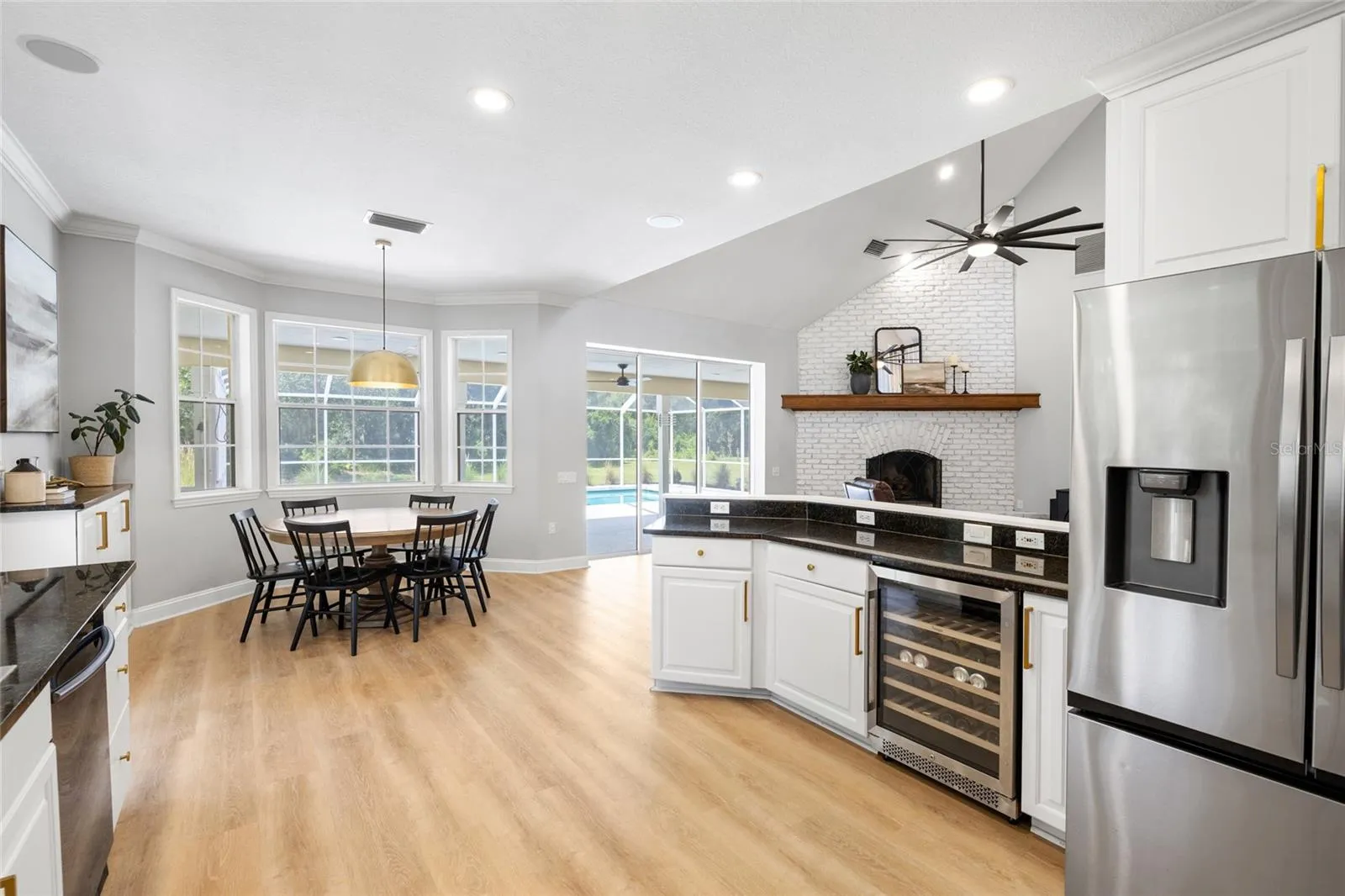Kitchen looking toward breakfast nook and pool area.