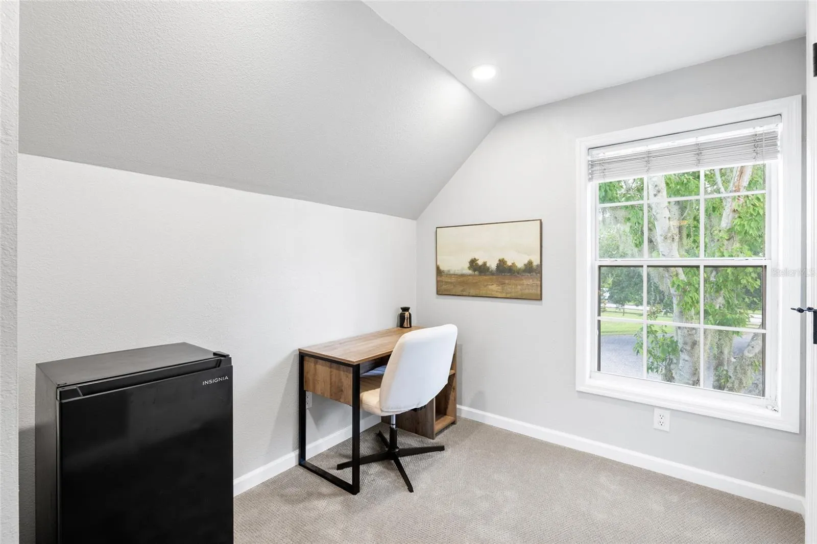 Seating area - garage suite - looking to front of house.