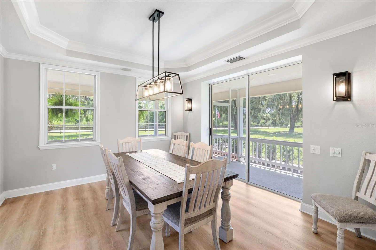 Formal dining room from kitchen. Over looks wrap around porch.