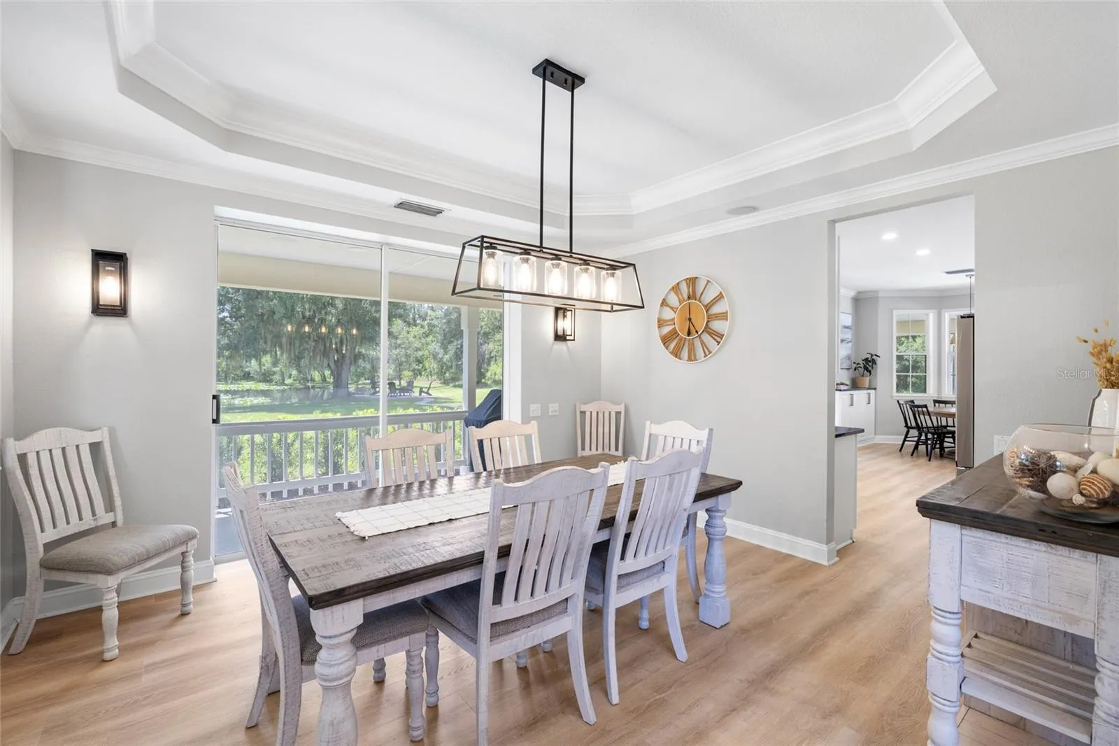 Formal dining area. Over looks wrap around porch and fully stocked pond.