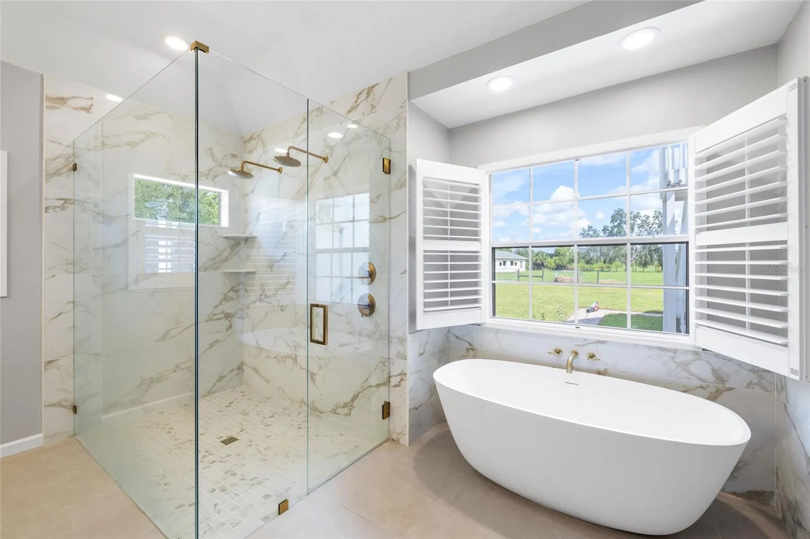 Primary bath garden/soaking tub, double shower.