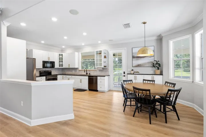 Kitchen and eat in nook area from the pool.