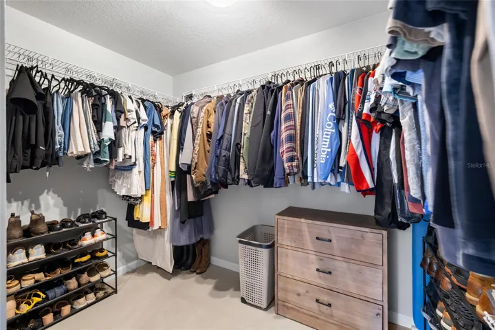 Primary suite walk-in-closet.