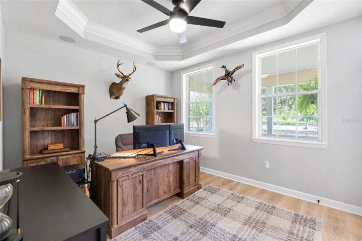 Front bedroom / office / flex space. Walk in closet in room.