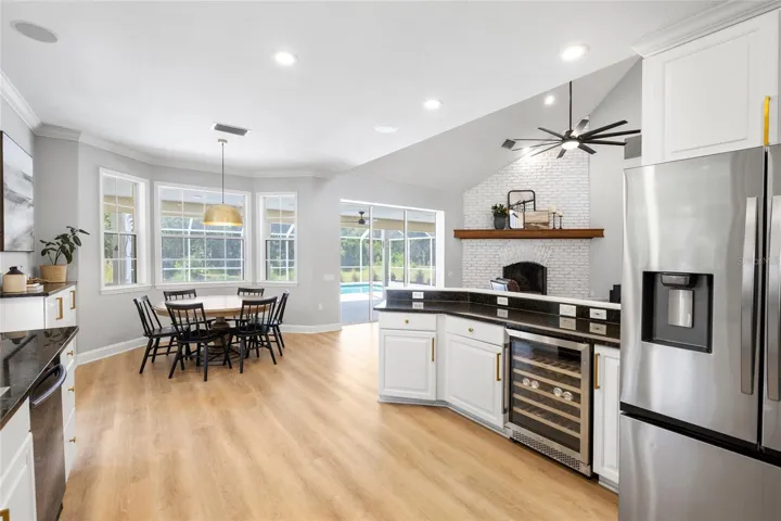 Kitchen looking toward breakfast nook and pool area.