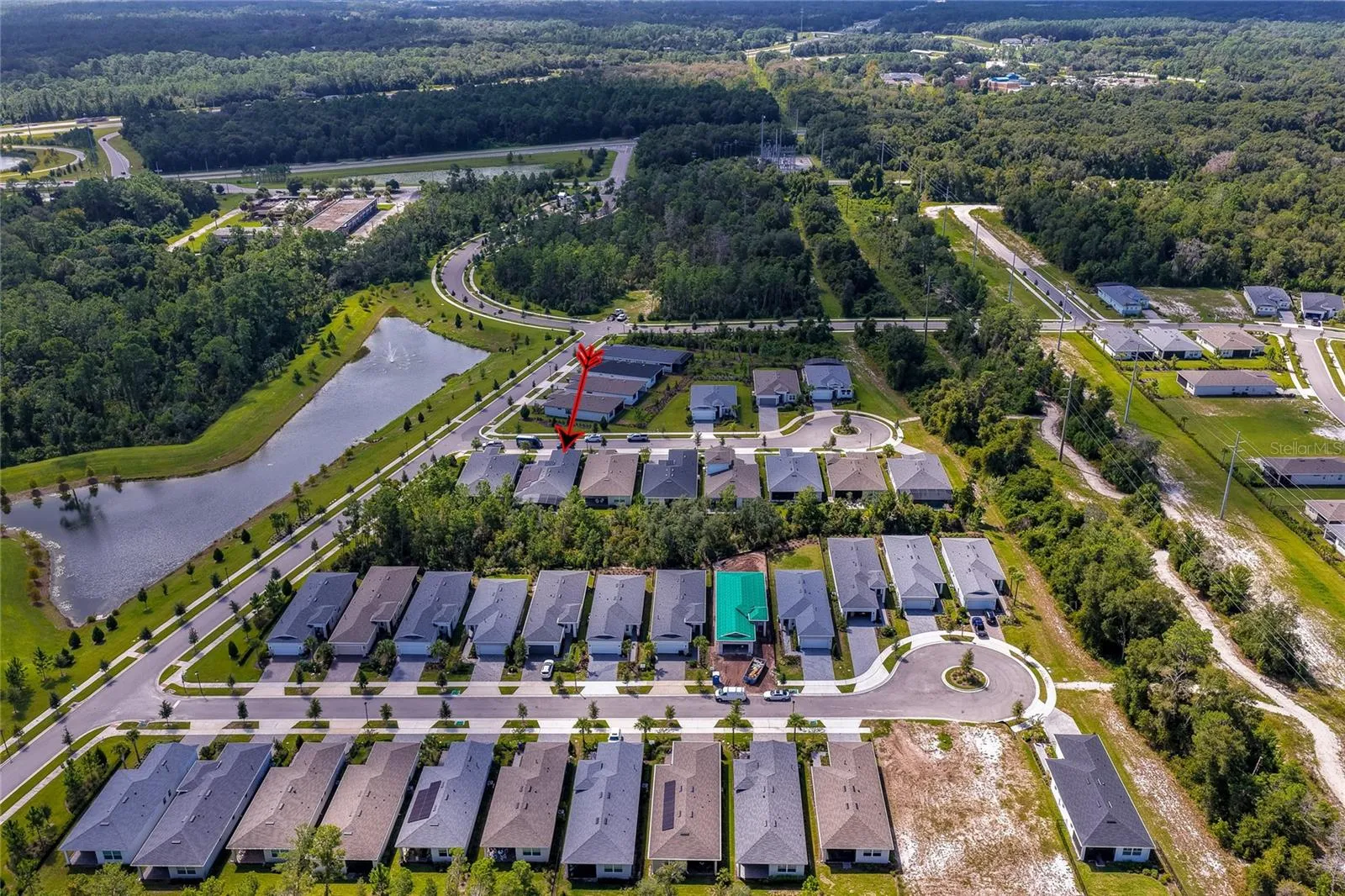 House to gate and Highway 44