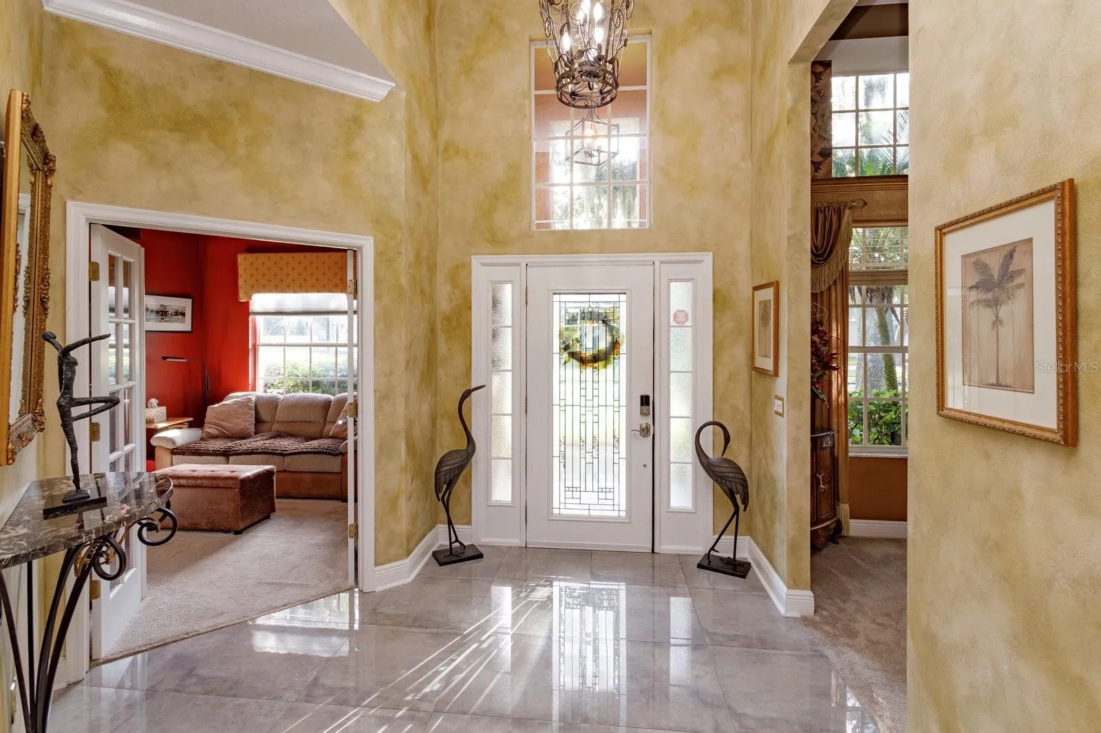 Foyer with bdrm 4 on left and dining room on right