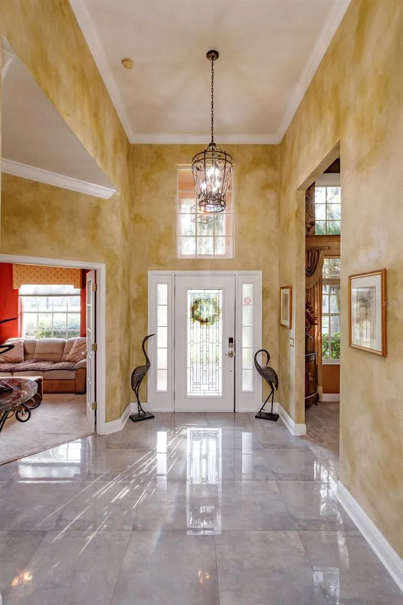 Elegant Foyer with 13+ft ceiling