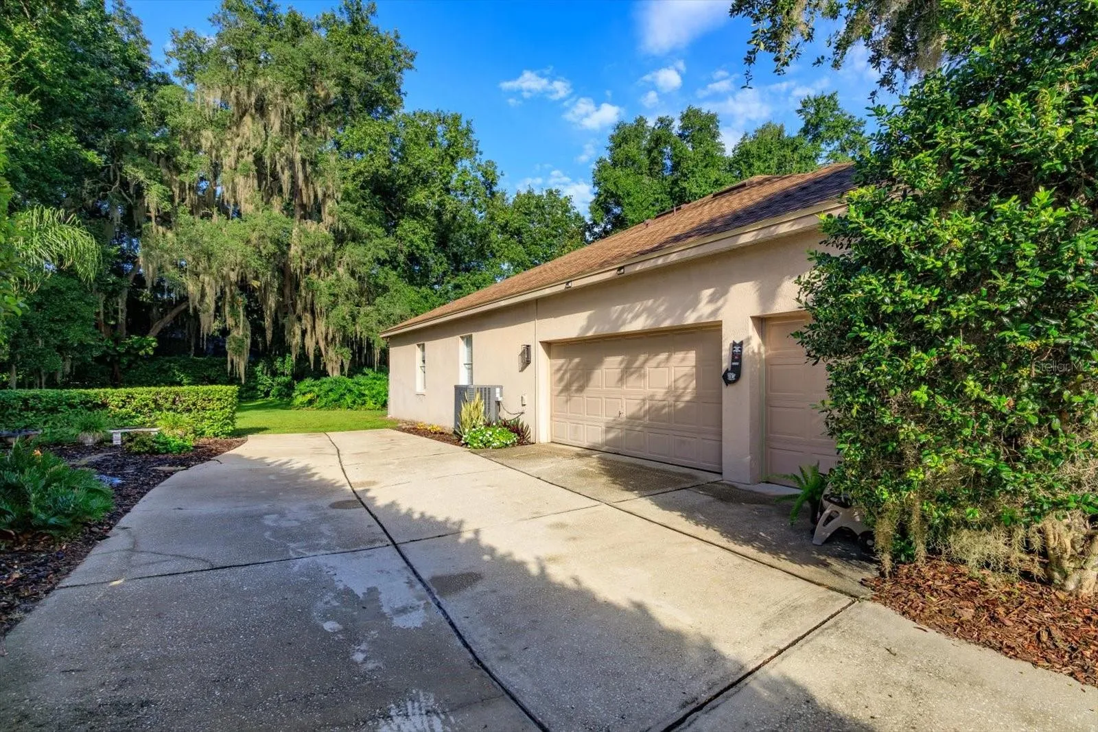 Side Entry 3-Car Garage and plenty of driveway parking