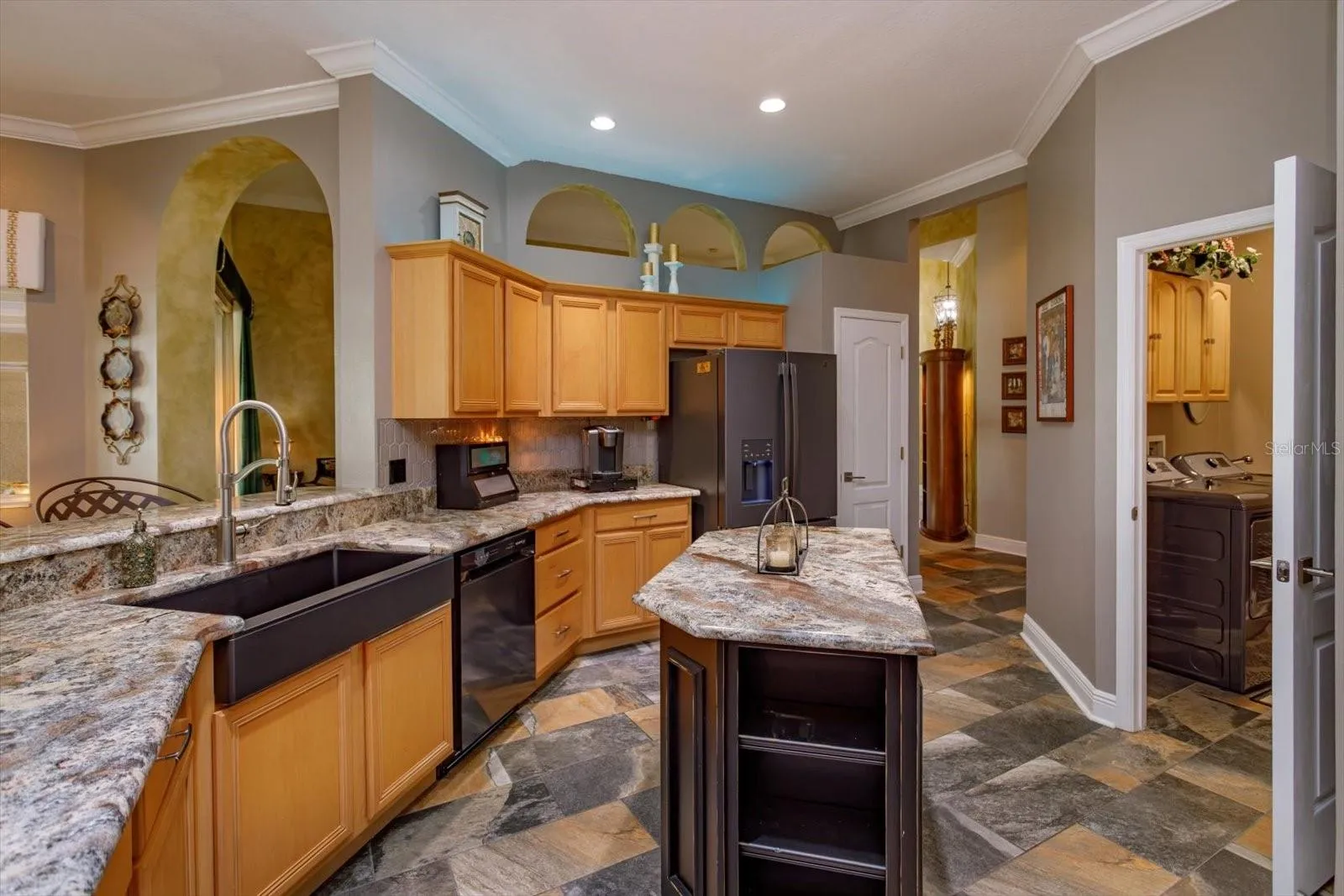 black granite apron sink and new frig &amp; dishwasher