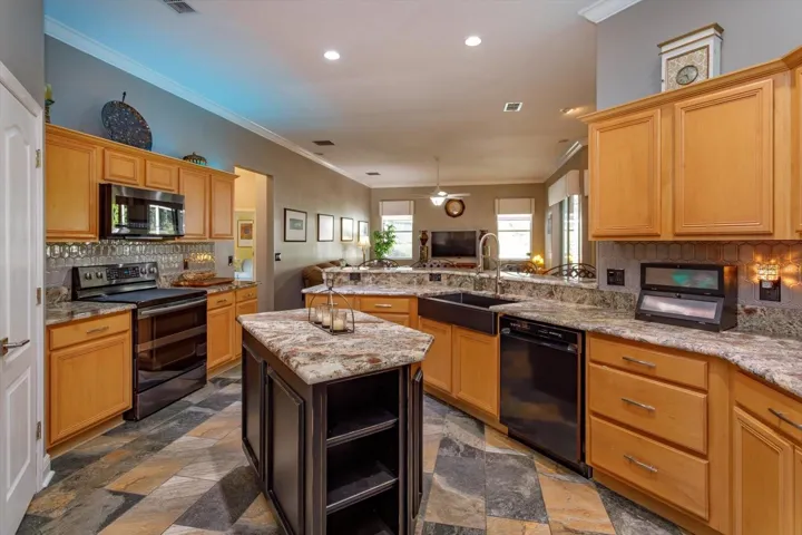 Spacious kitchen with custom made island