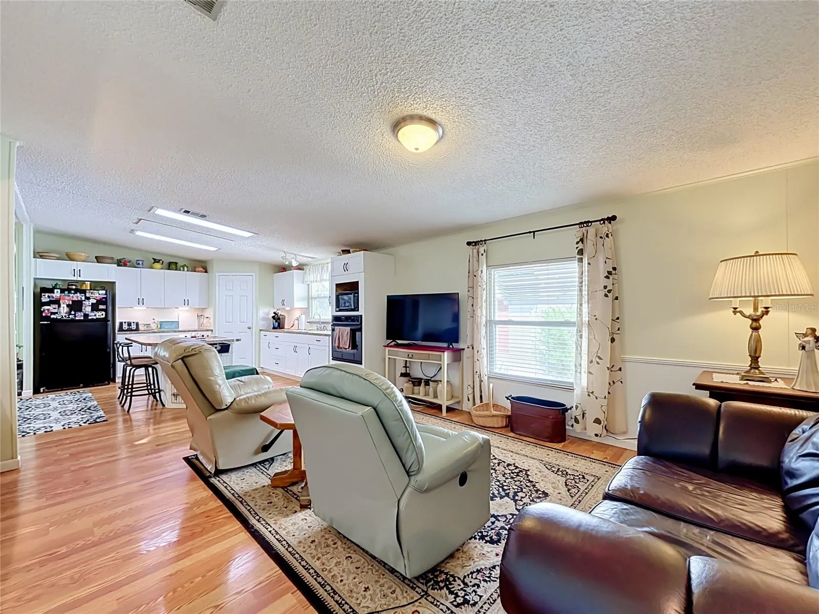 Family room sits alongside kitchen