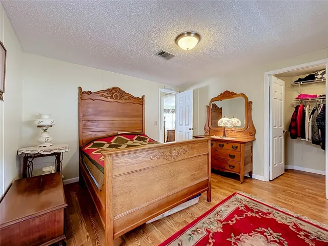 Generously sized second bedroom with walk-in closet
