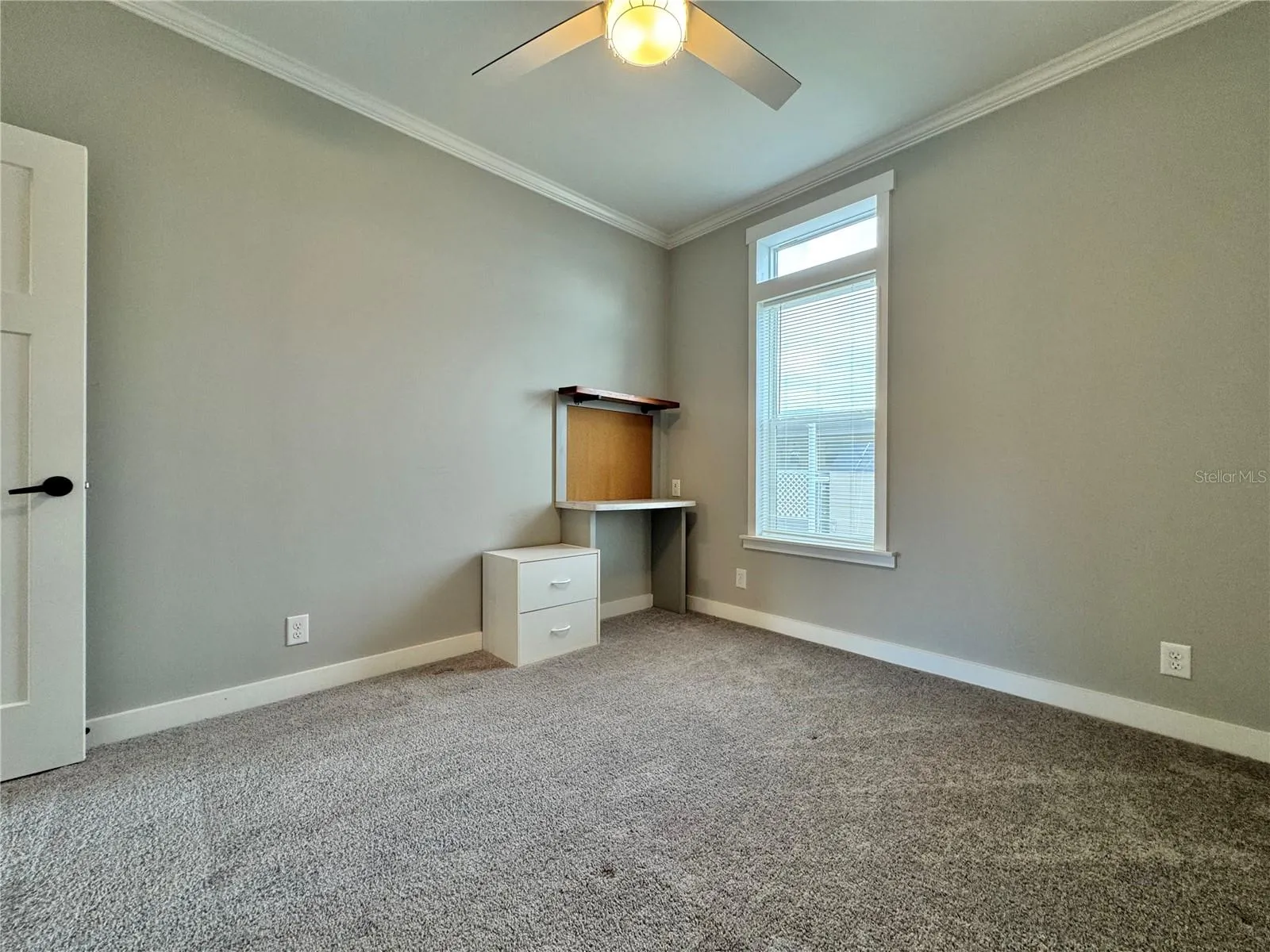 bedroom 3 with built-in desk.