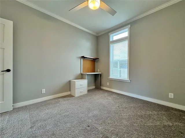 bedroom 3 with built-in desk.