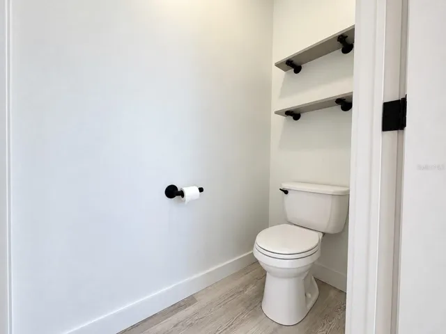 Water closet in primary bathroom.