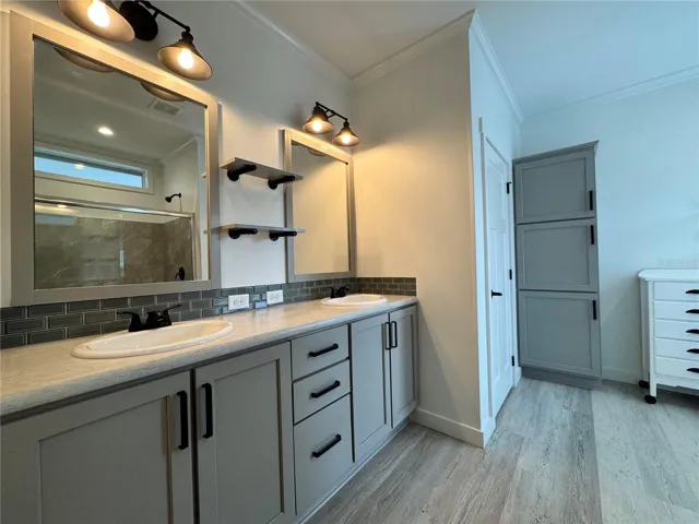 Primary bathroom with dual sinks.