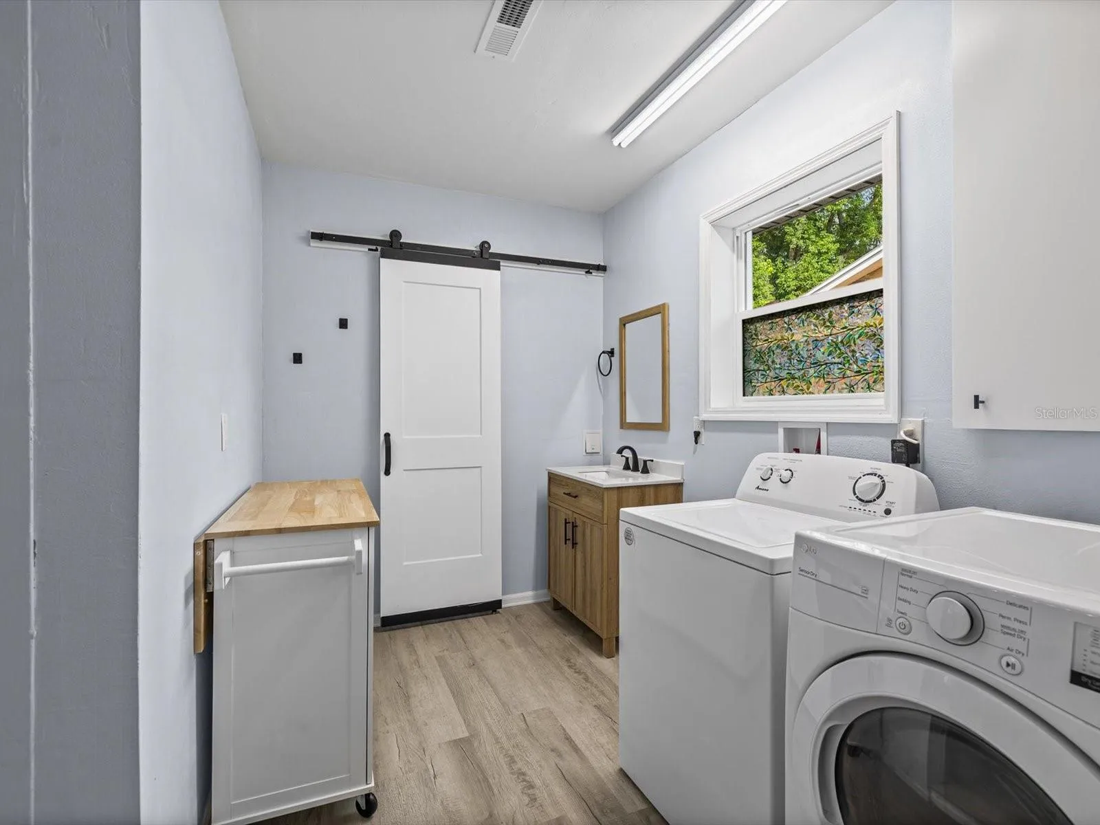 Inside Washer and Dryer and Second Full Bath