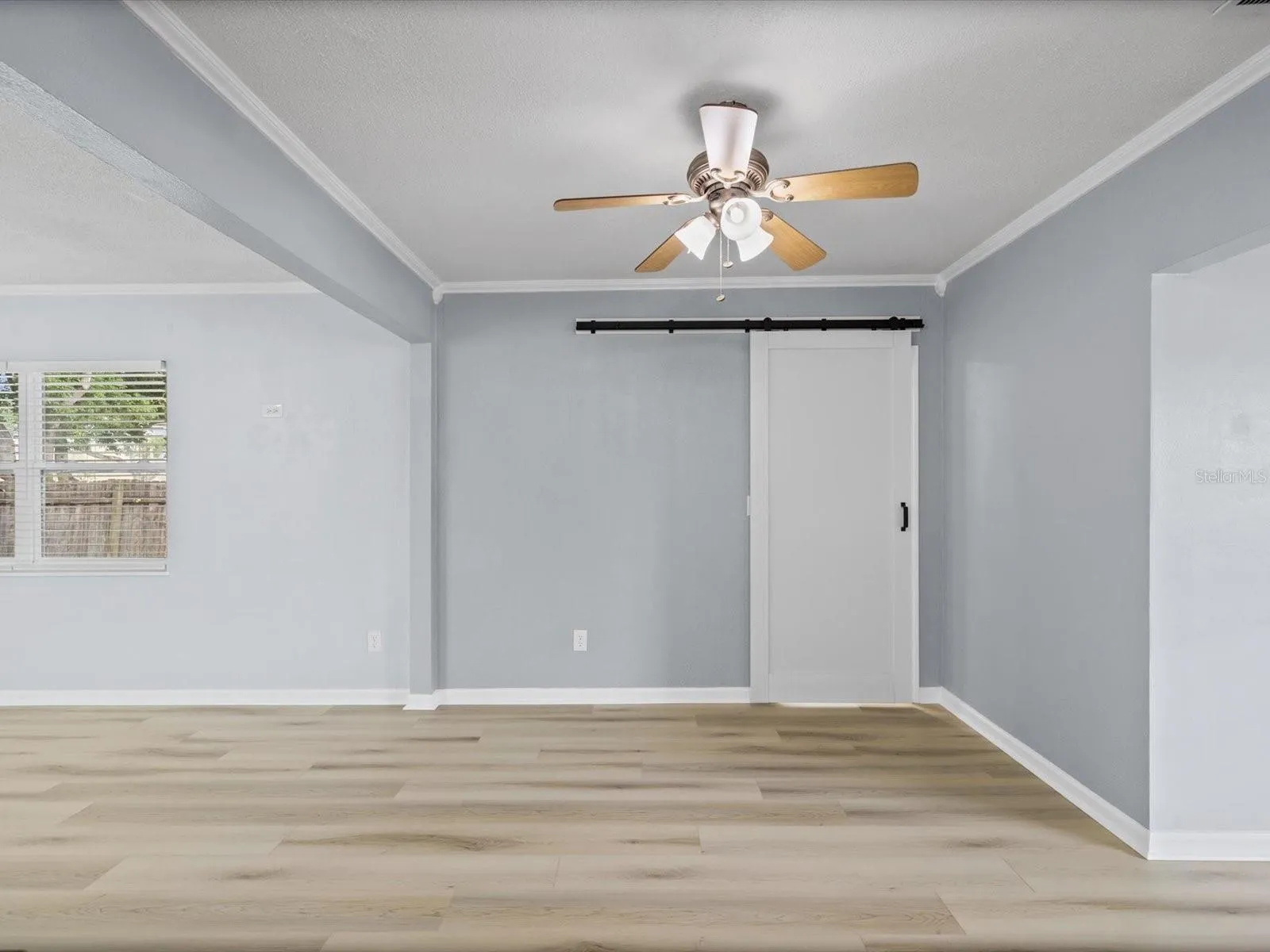 Dining Area/Barn Door to 2nd Full Bath/Laundry