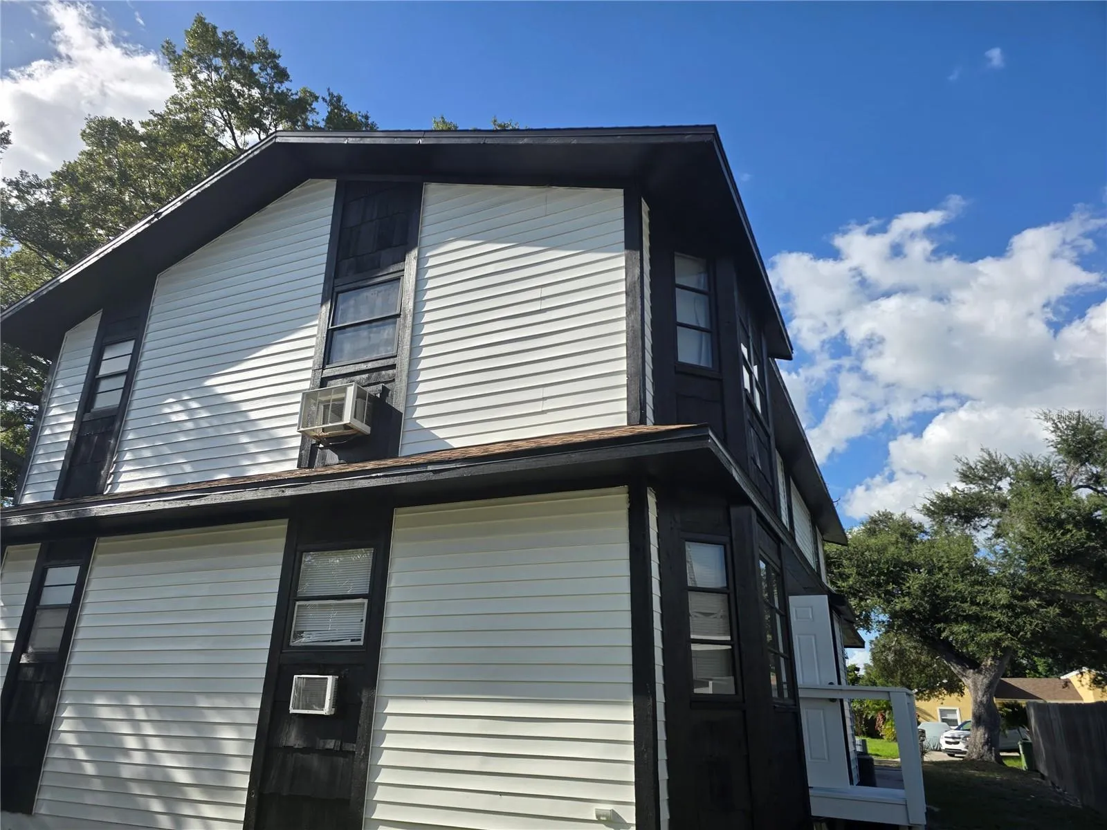 Wood frame with vinyl siding