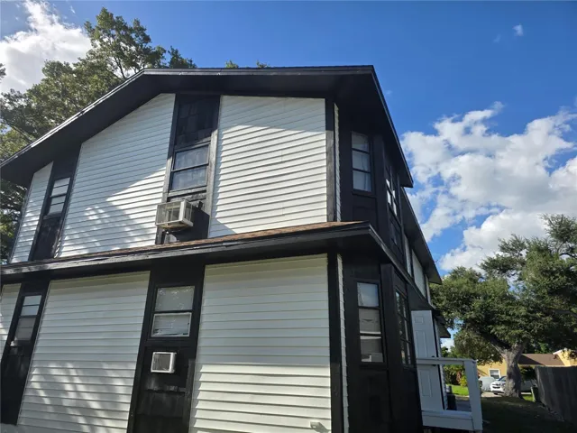 Wood frame with vinyl siding