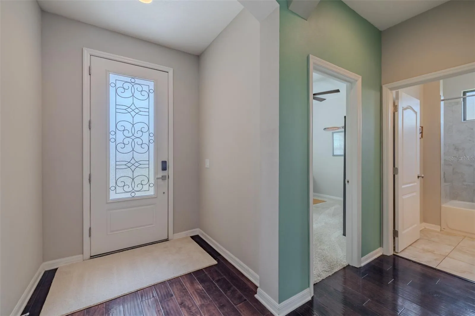Entry way with bedroom 4 & adjacent full bath