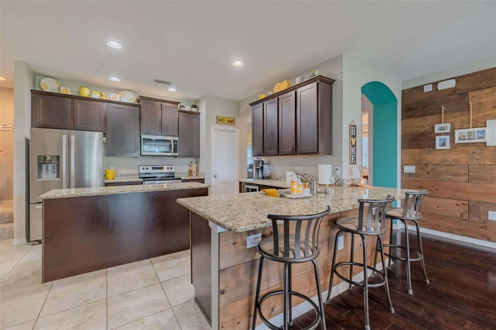 Chef inspired kitchen made for a chef with beverage frig