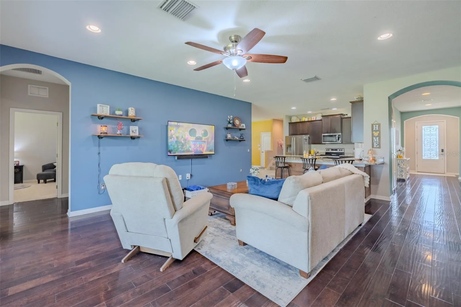 Look at those floors in this stunning family room!!!