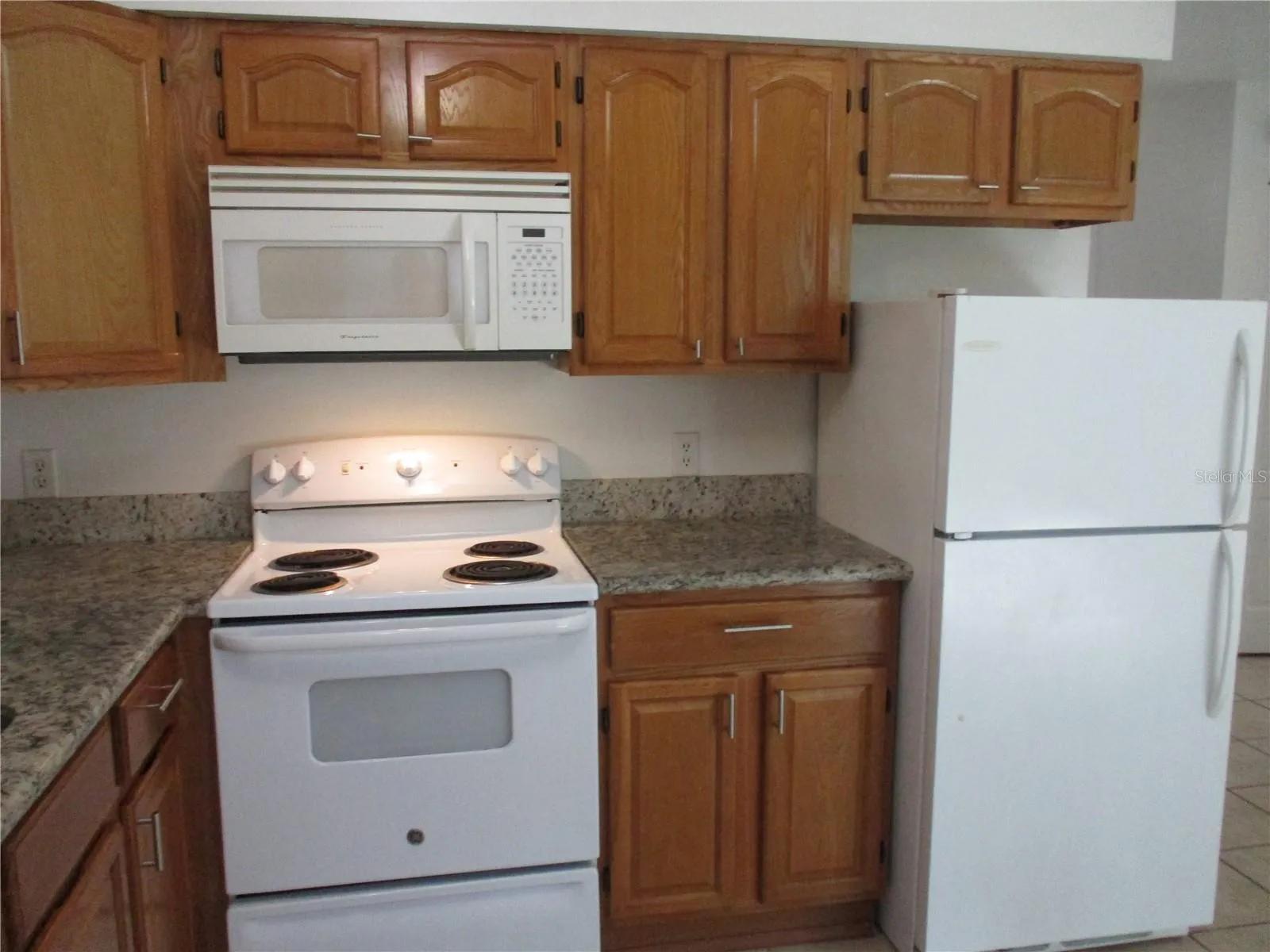 Wood cabinets and all appliances included