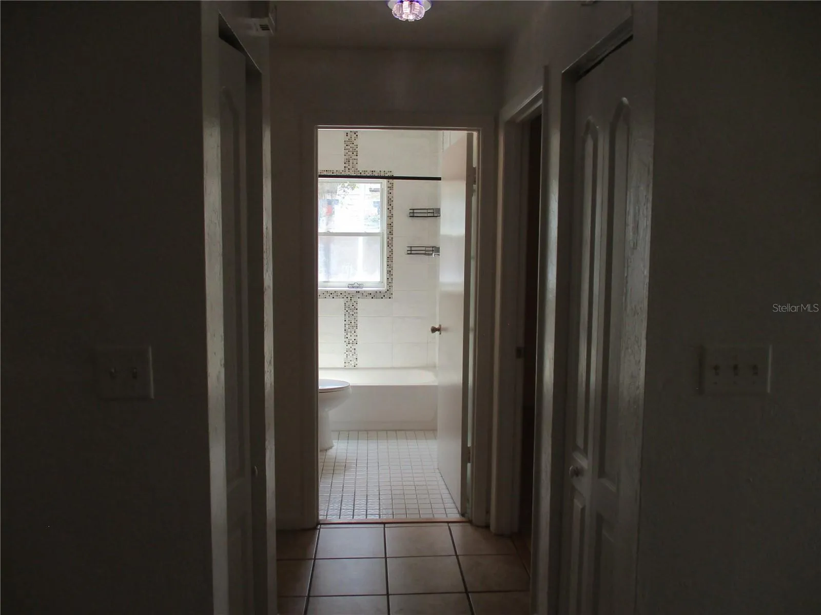 Hallway to bedrooms and bathroom