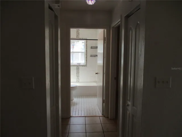 Hallway to bedrooms and bathroom