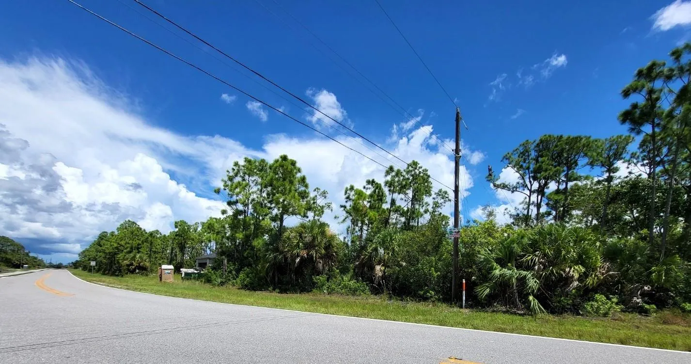 Looking North. Home under construction on adjacent lot.