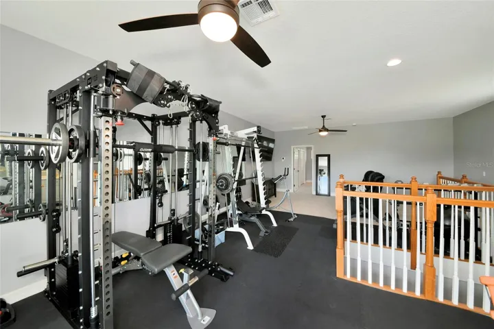 upstaris bonus room gym matting can be removed.  plenty of space for a pool table, or home theater.