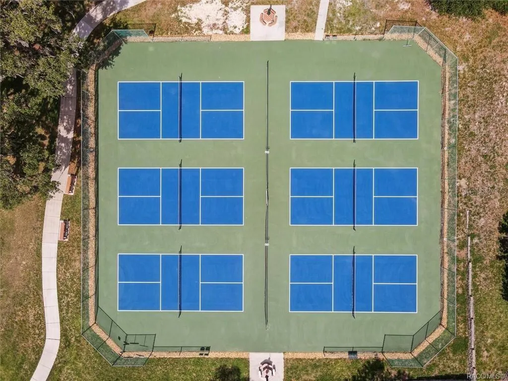PICKLEBALL/TENNIS COURTS – Meadowcrest offers multiple pickleball courts as part of its extensive recreational amenities.
