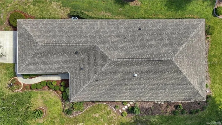 AERIAL ROOF VIEW – Direct overhead aerial providing a clear view of the home’s roofline, footprint, surrounding landscaping &amp; walkways.