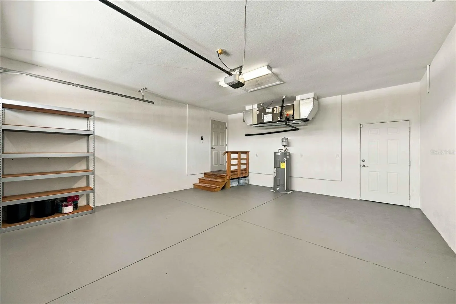 spacious 2 car garage and freshly painted floor
