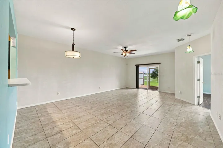 main living area looking over golf course and lake