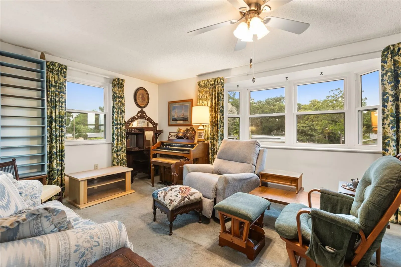 Upstairs living room with beautiful bay window.