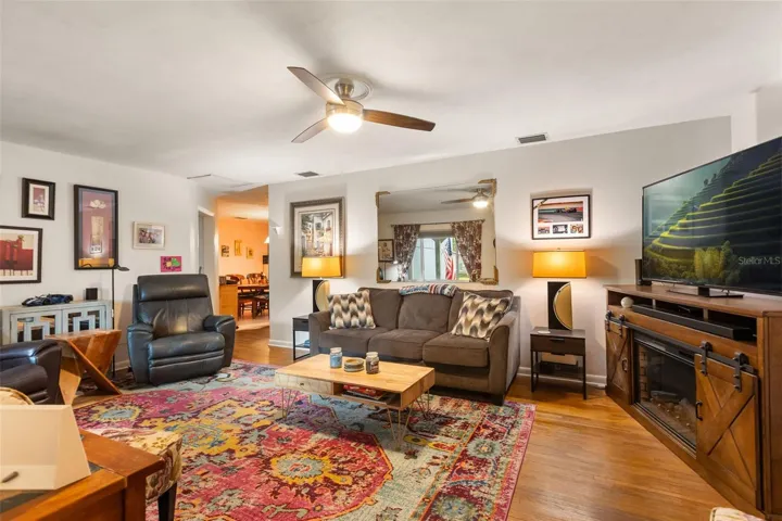 Looking from front entry towards dining room and kitchen.