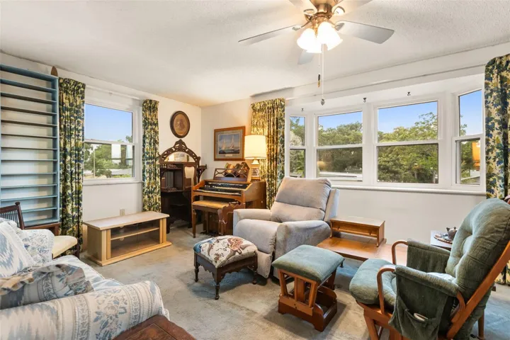 Upstairs living room with beautiful bay window.