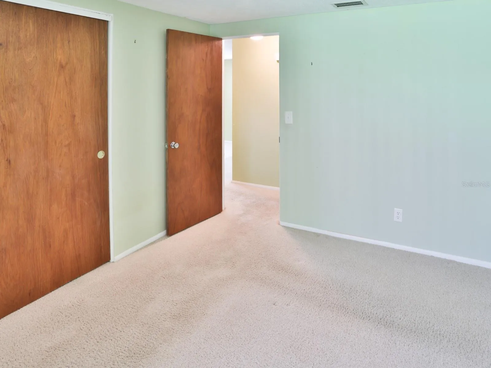 Bedroom with double closets.