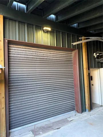 10X10 roll up door off back to canopy area