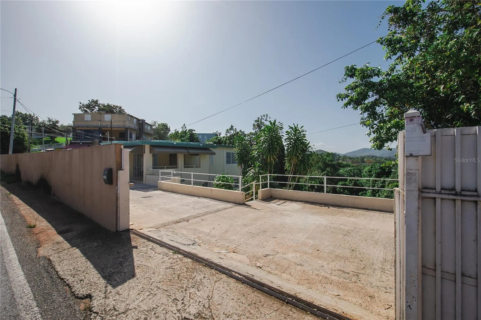 Main Entrance with Electric Gate. For Added Privacy and Security.