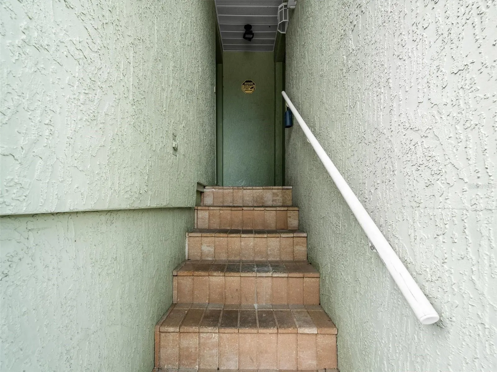 Stairs to both apartments
