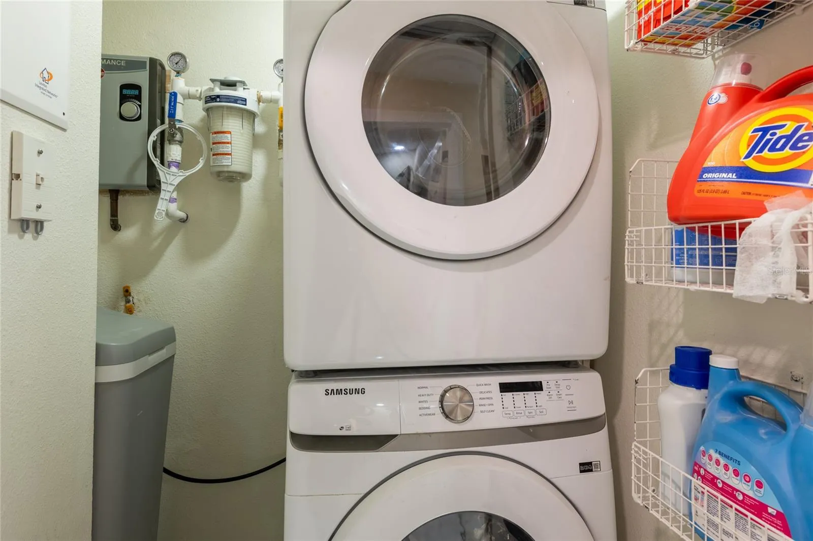 Full size Samsung washer and dryer, plus water softener, , water filter and on demand water heater.