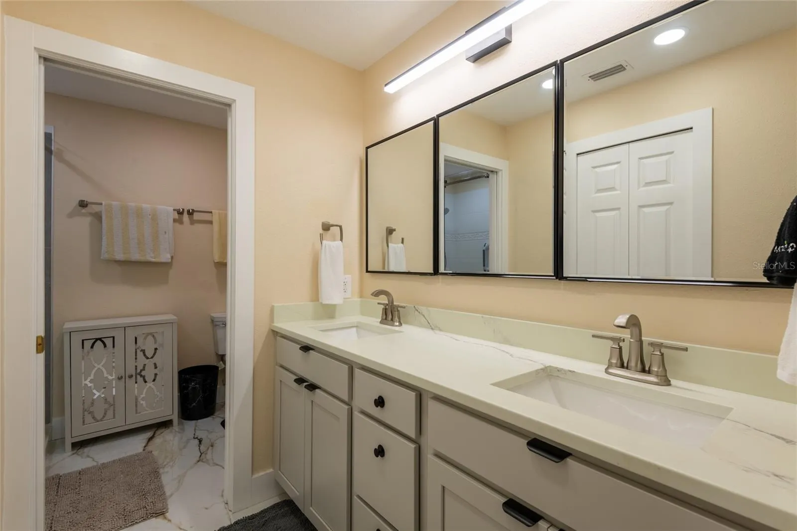This is totally custom.  Mirrors open to plenty of shelving.  Sof close doors and drawers.,